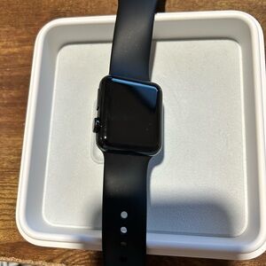 Apple Watch First Generation 38mm with Black Band and spare band.